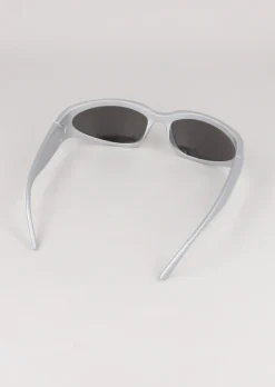 Lentes oscuros alargados sport