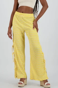 Pantalon amplio detalle lazos estampado