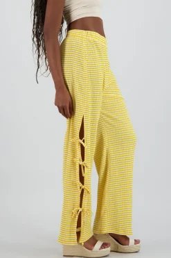 Pantalon amplio detalle lazos estampado