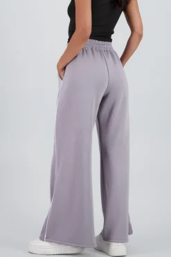 Pantalon amplio detalle linea contraste