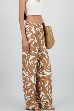 Pantalon amplio detalle resorte estampado figuras