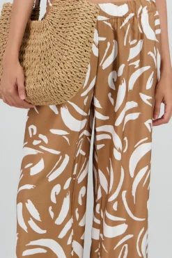 Pantalon amplio detalle resorte estampado figuras