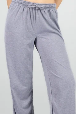 Pantalon flare suave liso