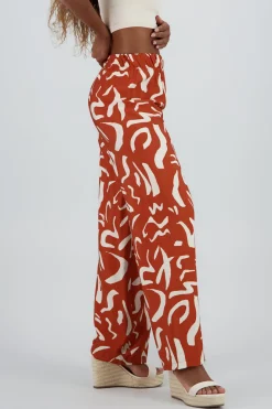 Pantalon fluido detalle estampado