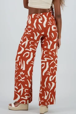 Pantalon fluido detalle estampado