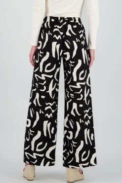 Pantalon fluido detalle estampado