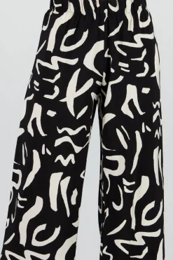 Pantalon fluido detalle estampado