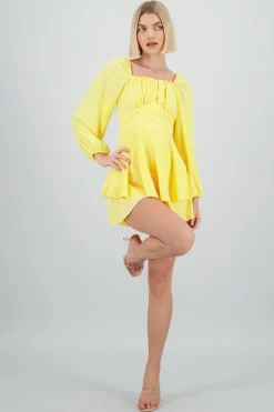 Romper liso con mangas abullonadas