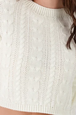 Suéter corto tejido trenzado