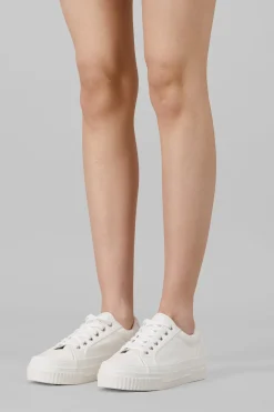 Tenis clásico suela ancha puntera