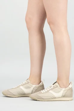 Tenis suela dentada contraste material