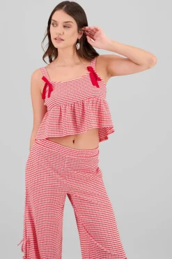 Top con olan tirantes detalle moños