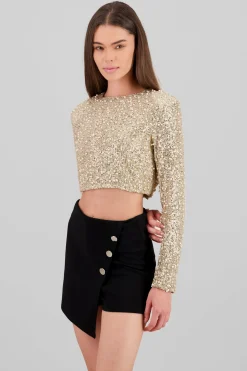 Top manga larga crop lentejuela detalle aplicacion