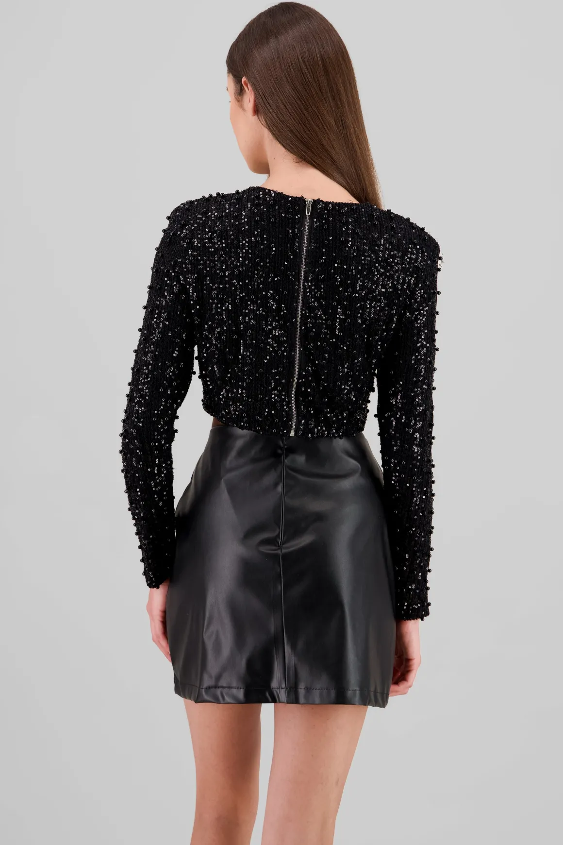 Top manga larga crop lentejuela detalle aplicacion