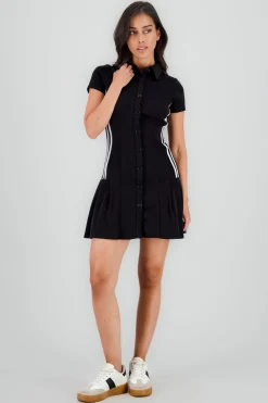 Vestido mini falda tableada cuello polo