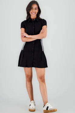 Vestido mini falda tableada cuello polo