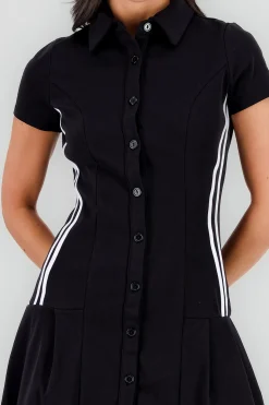 Vestido mini falda tableada cuello polo